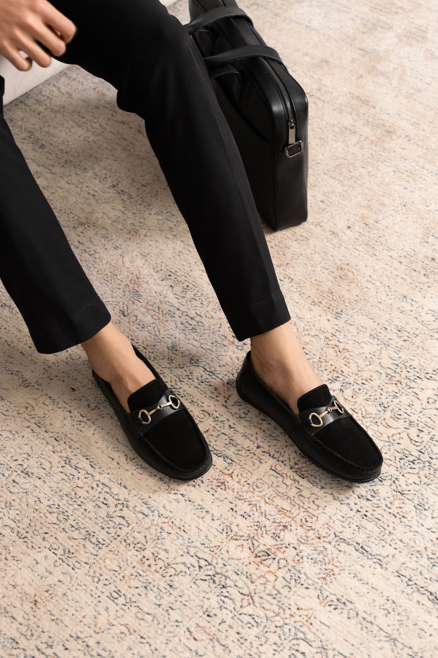 Mens suede and leather moccasins in black colour with metallic light gold horsebit buckle by JULKE.