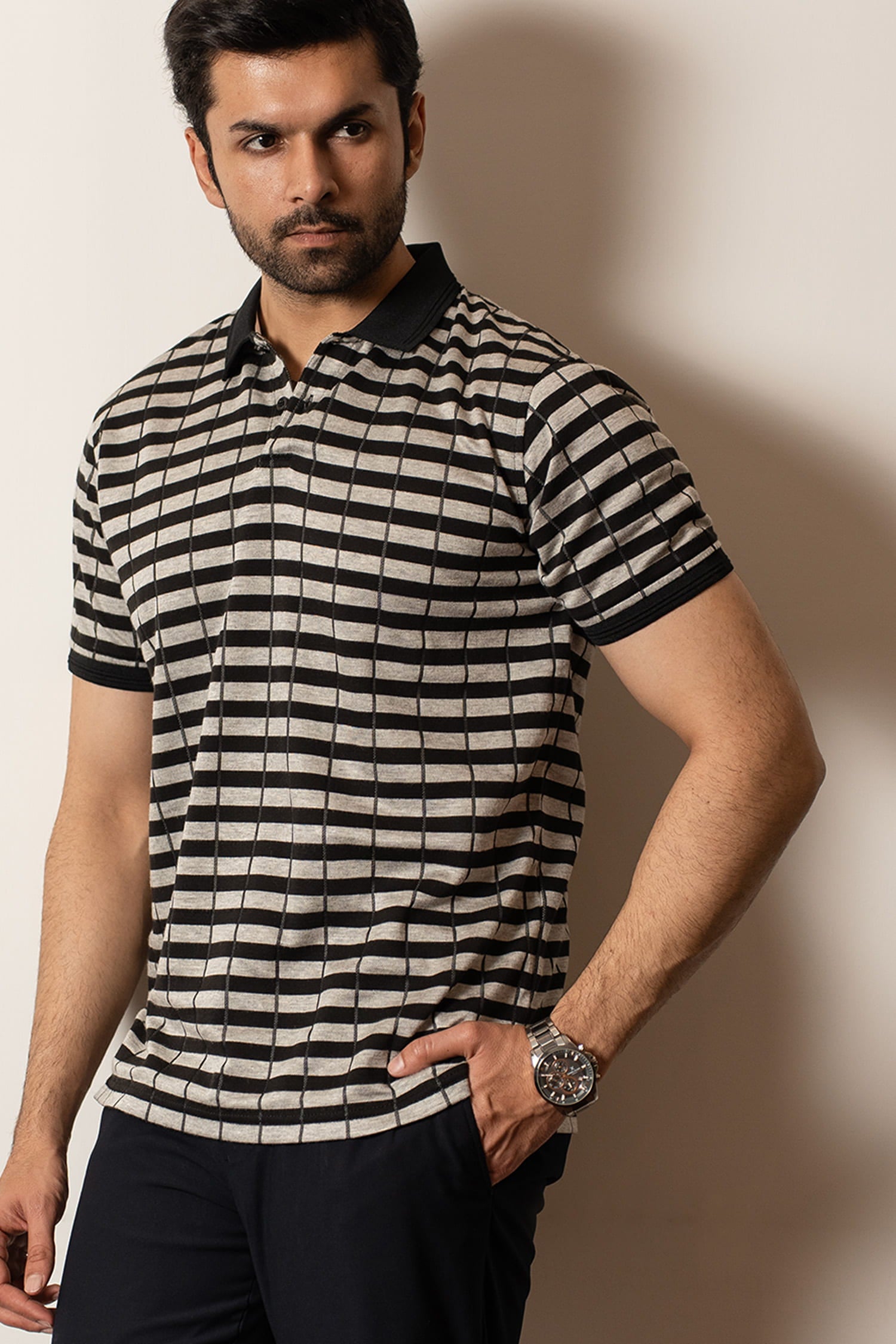 Mens half sleeve polo shirt in black and beige stripes with black collar and sleeve cuffs by JULKE.
