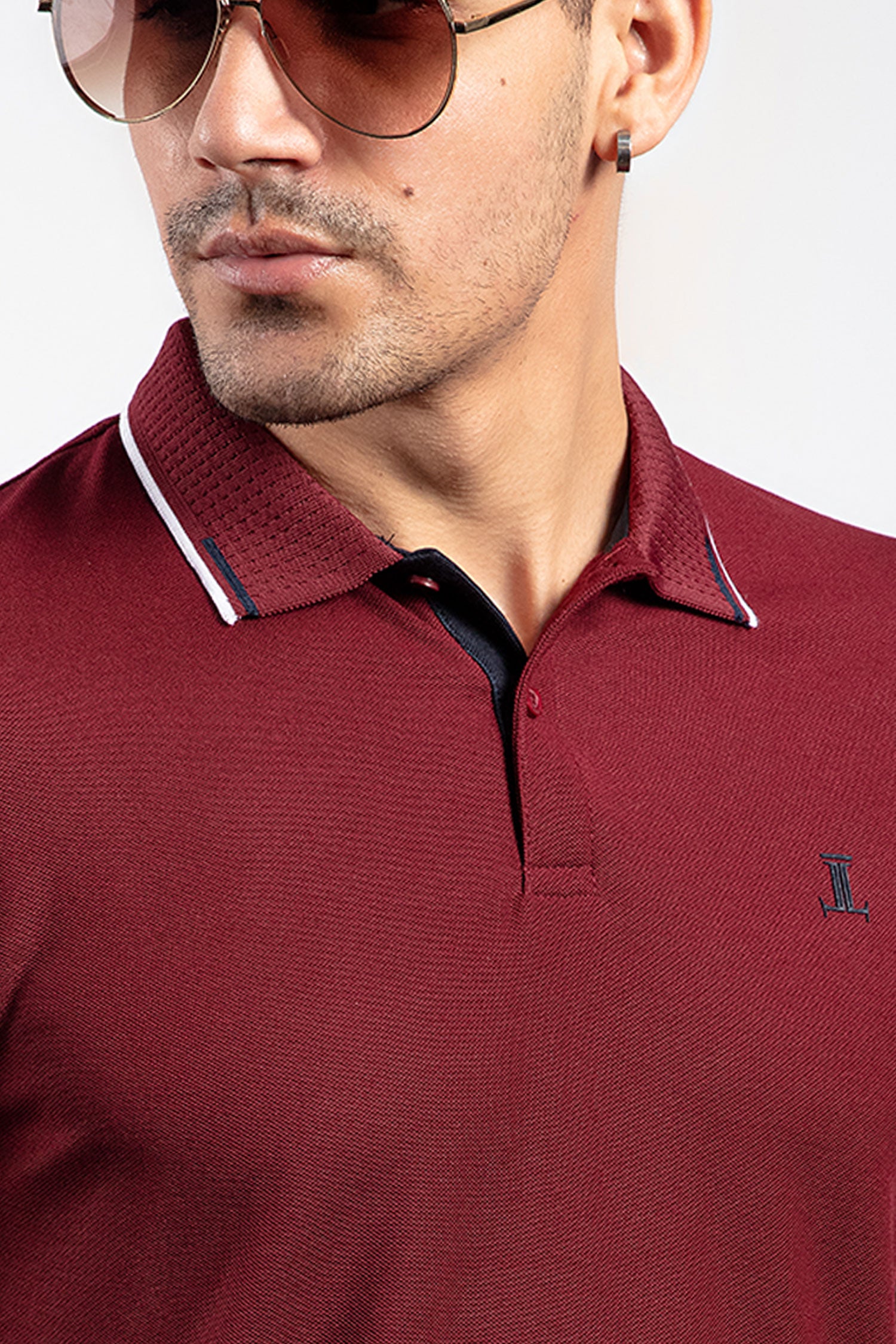 Mens summer polo shirt in burgundy colour with matching white outline tipped collar and half sleeves by JULKE.