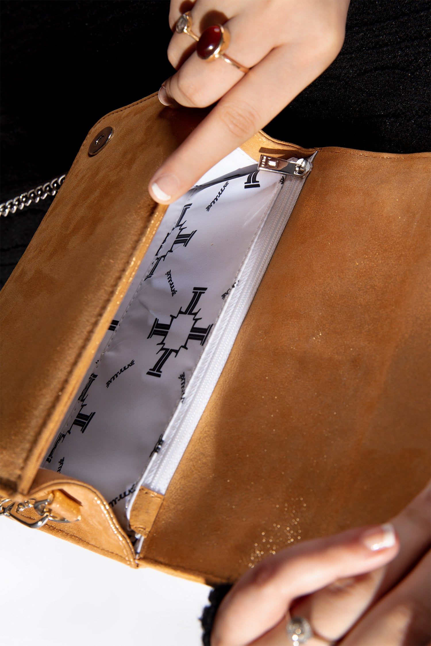 Womens leather shoulder bag in mustard colour with bows and pearl chain by JULKE