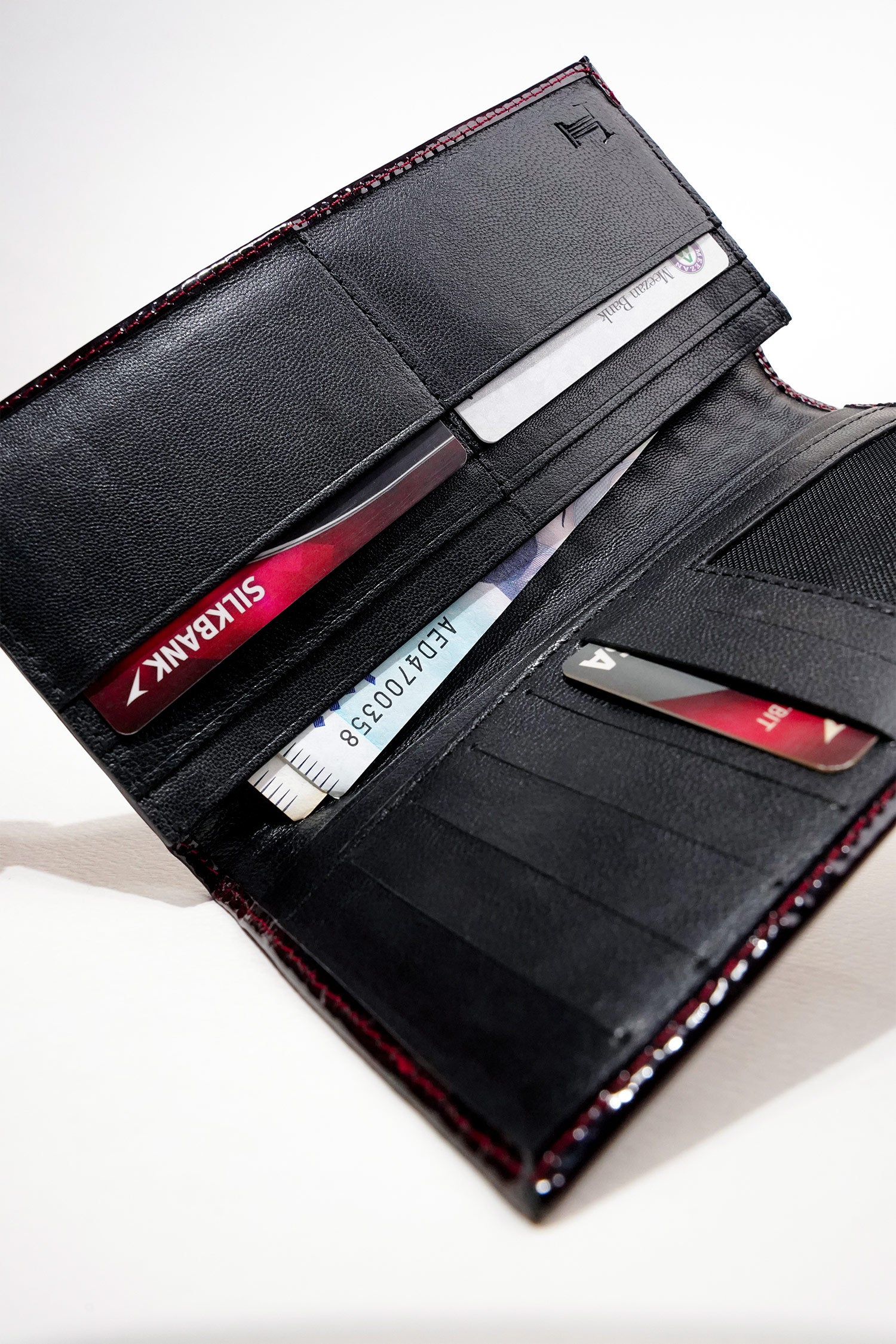 Mens leather long wallet in dark red colour with two tone patent and woven flap by JULKE