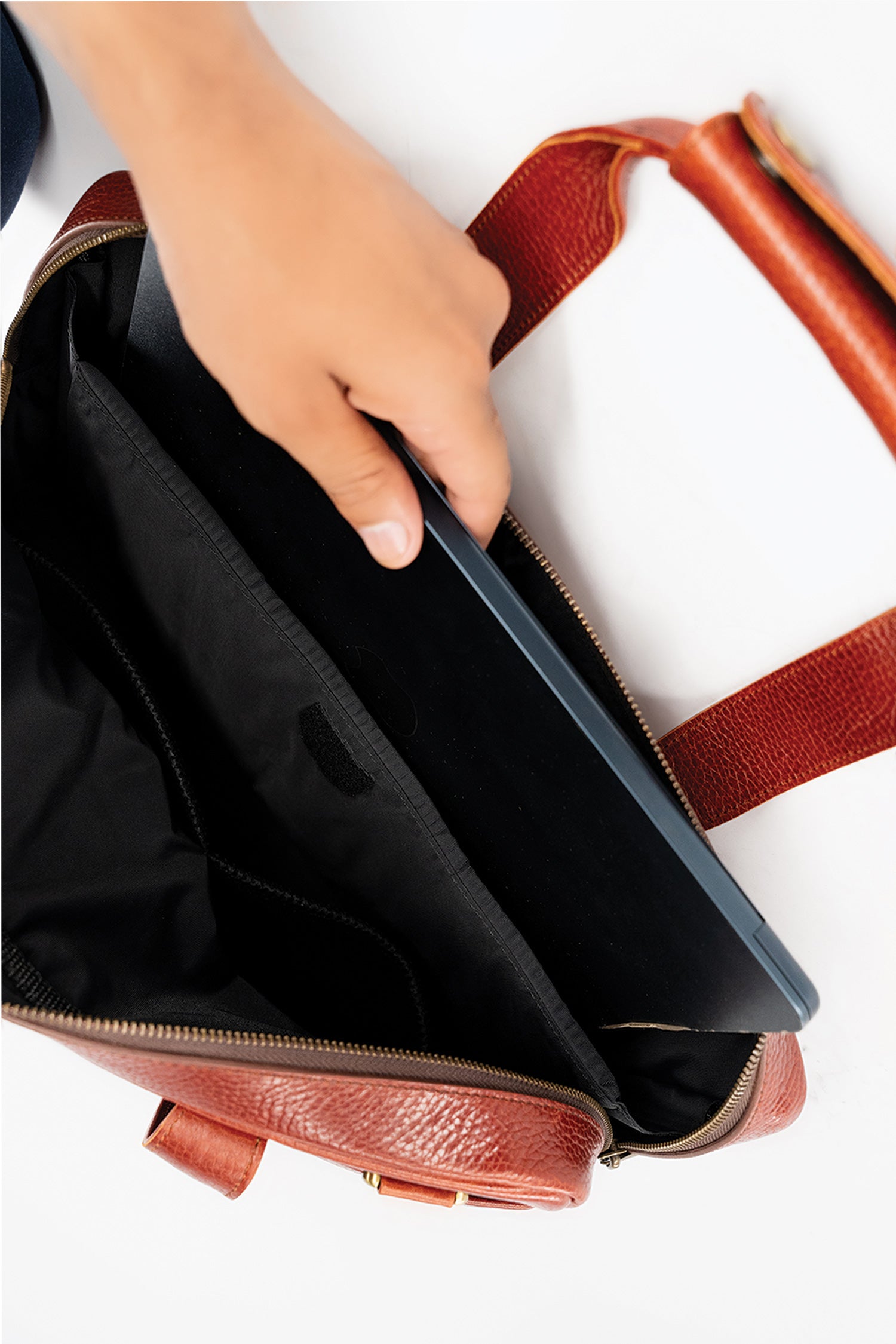 Mens soft leather laptop bag in red brown colour with extra pockets and long handles by JULKE