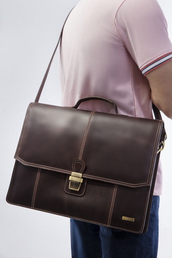 Leather laptop messenger bag in dark brown colour by JULKE