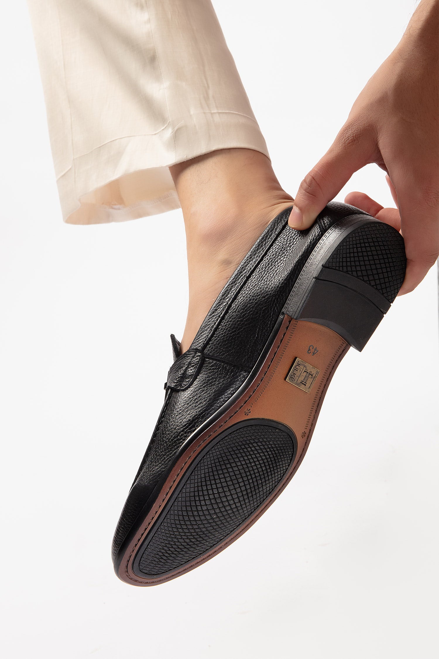 Mens leather round toe slip on shoes in black colour with leather and rubber sole and metal T-bar buckle by JULKE