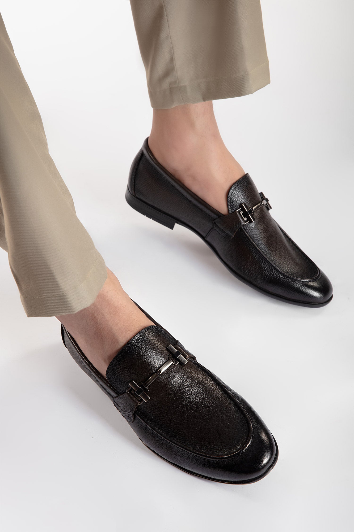 Mens leather round toe slip on shoes in dark brown two tone colour with leather and rubber sole and metal T-bar buckle by JULKE
