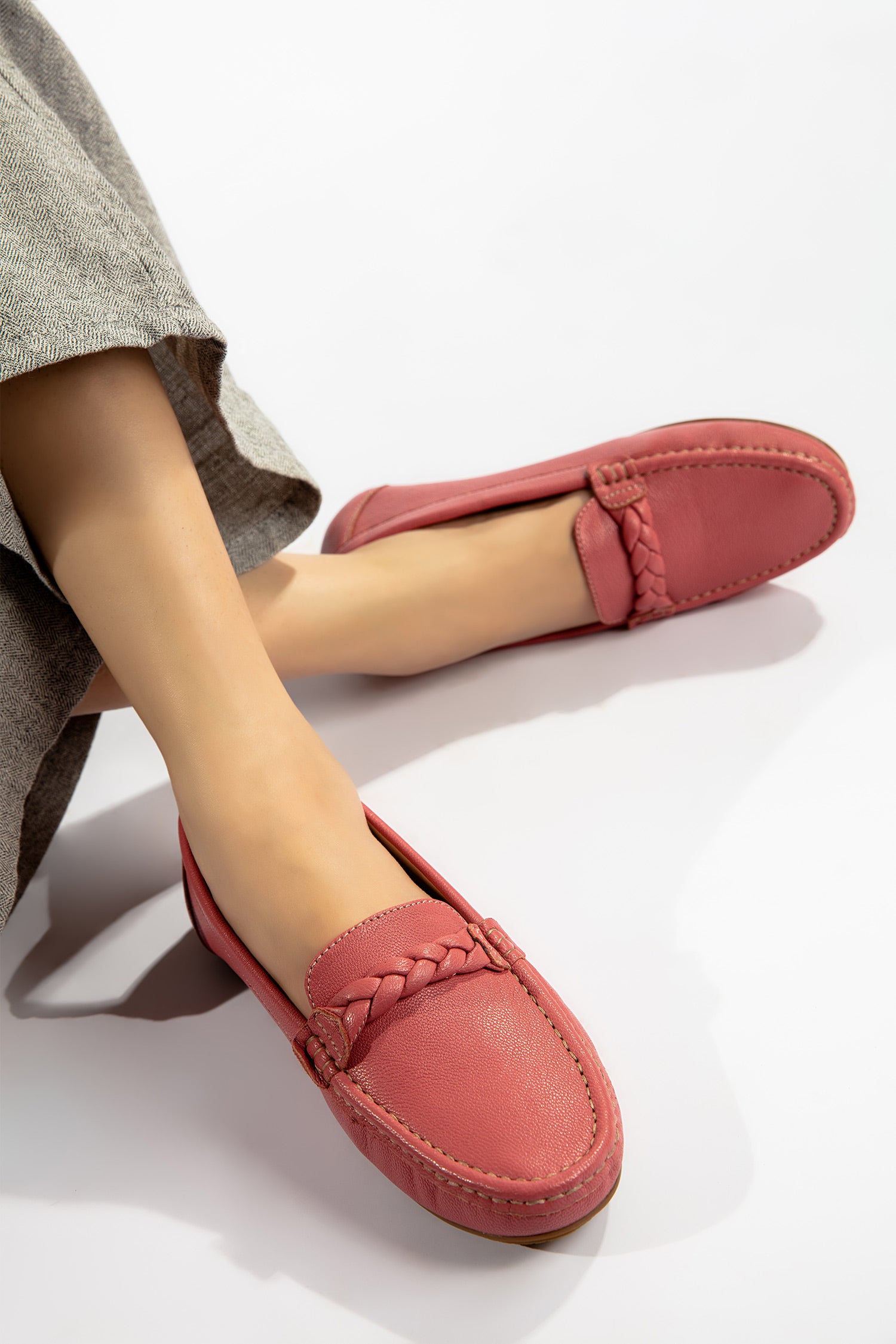 Womens winter moccasins in pink colour with braided straps by JULKE