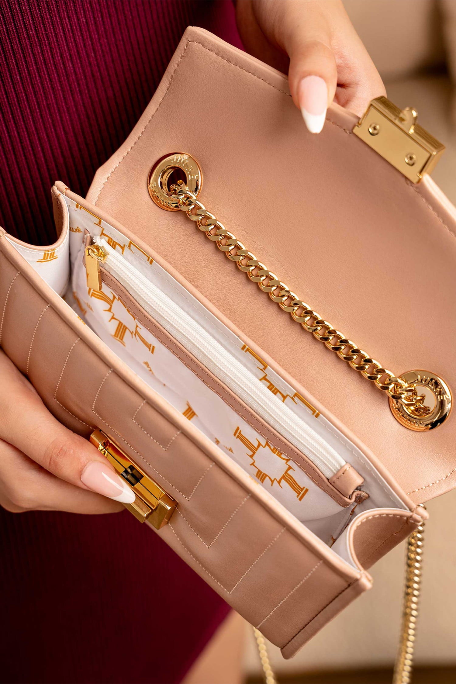 Womens leather shoulder clutch bag in tea pink colour with weaving quilted front flap and metallic gold hardware by JULKE.