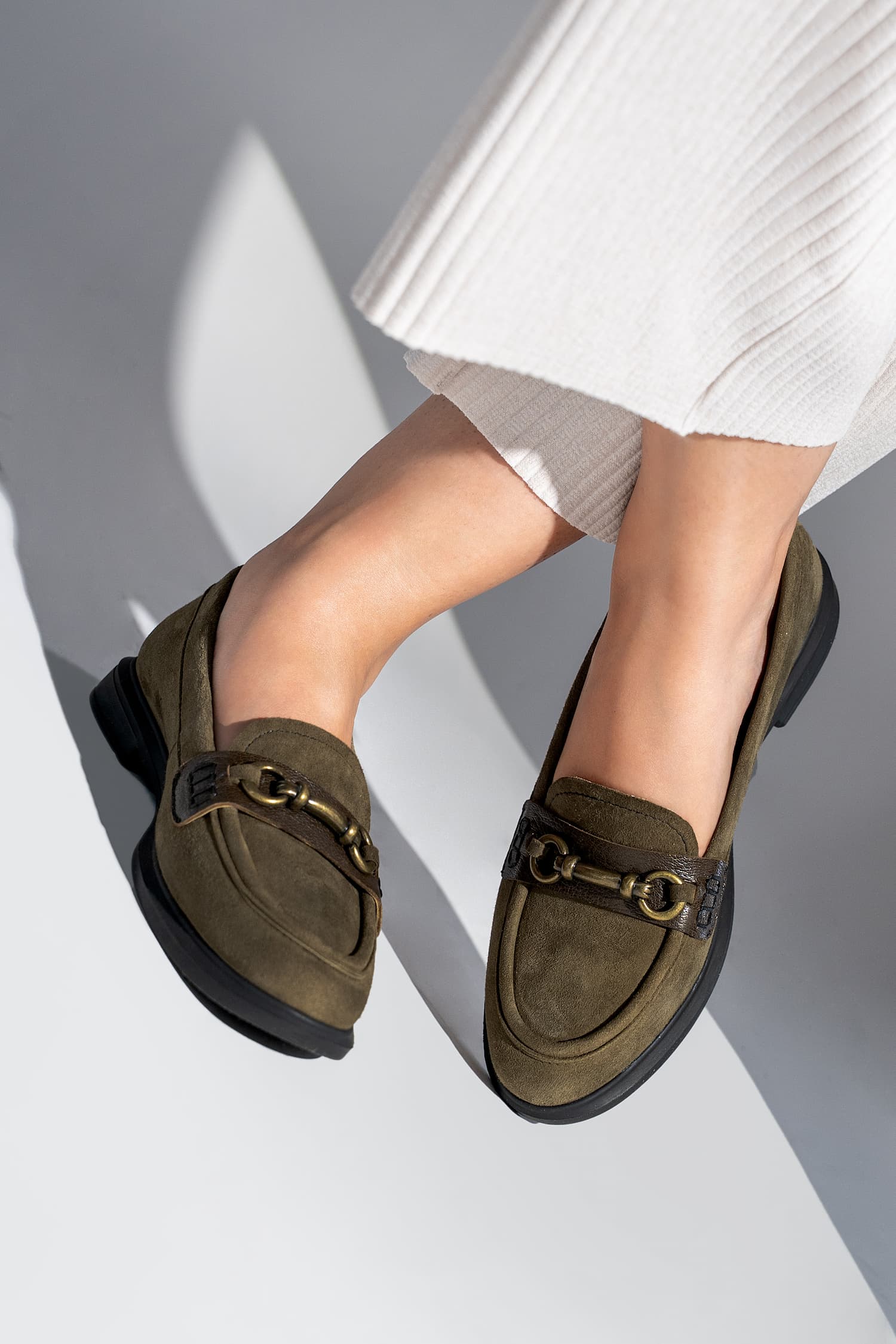 Womens suede leather loafers in olive green colour with block heel and metallic gold buckle by JULKE