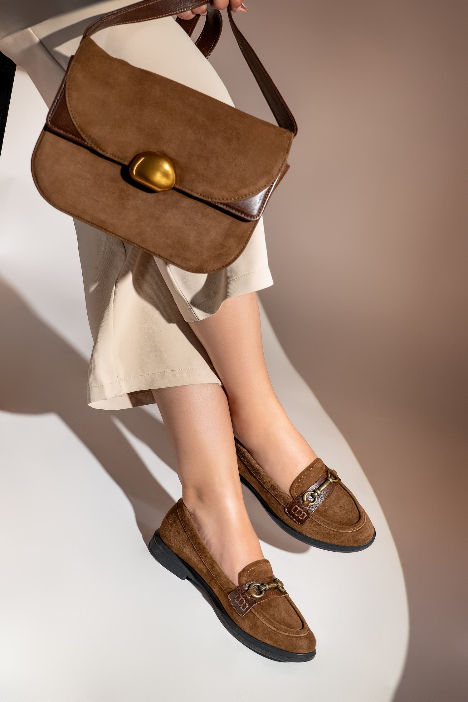 Womens suede leather loafers in brown colour with block heel and matching leather bag by JULKE.