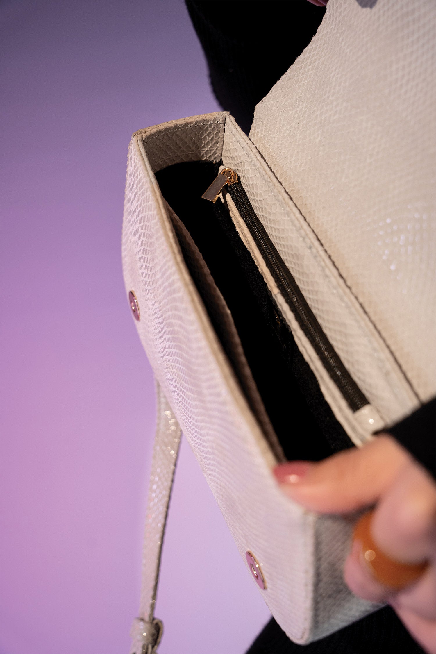 Women's leather top handle shoulder bag in white colour with snake print & texture by JULKE