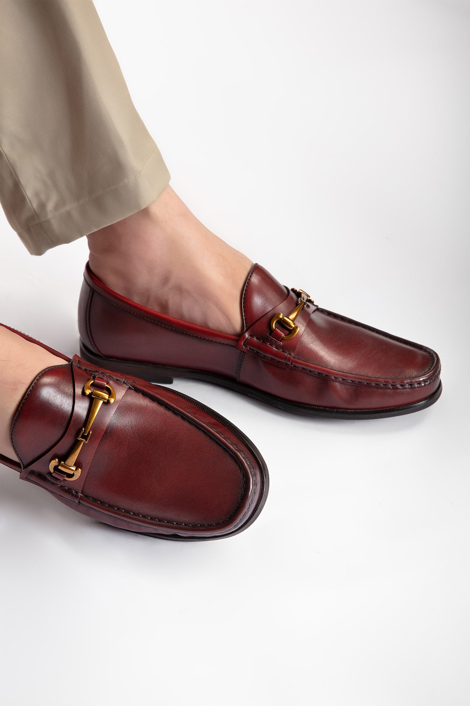Mens leather moc shoes in dark red colour with gold horse-bit buckle by JULKE