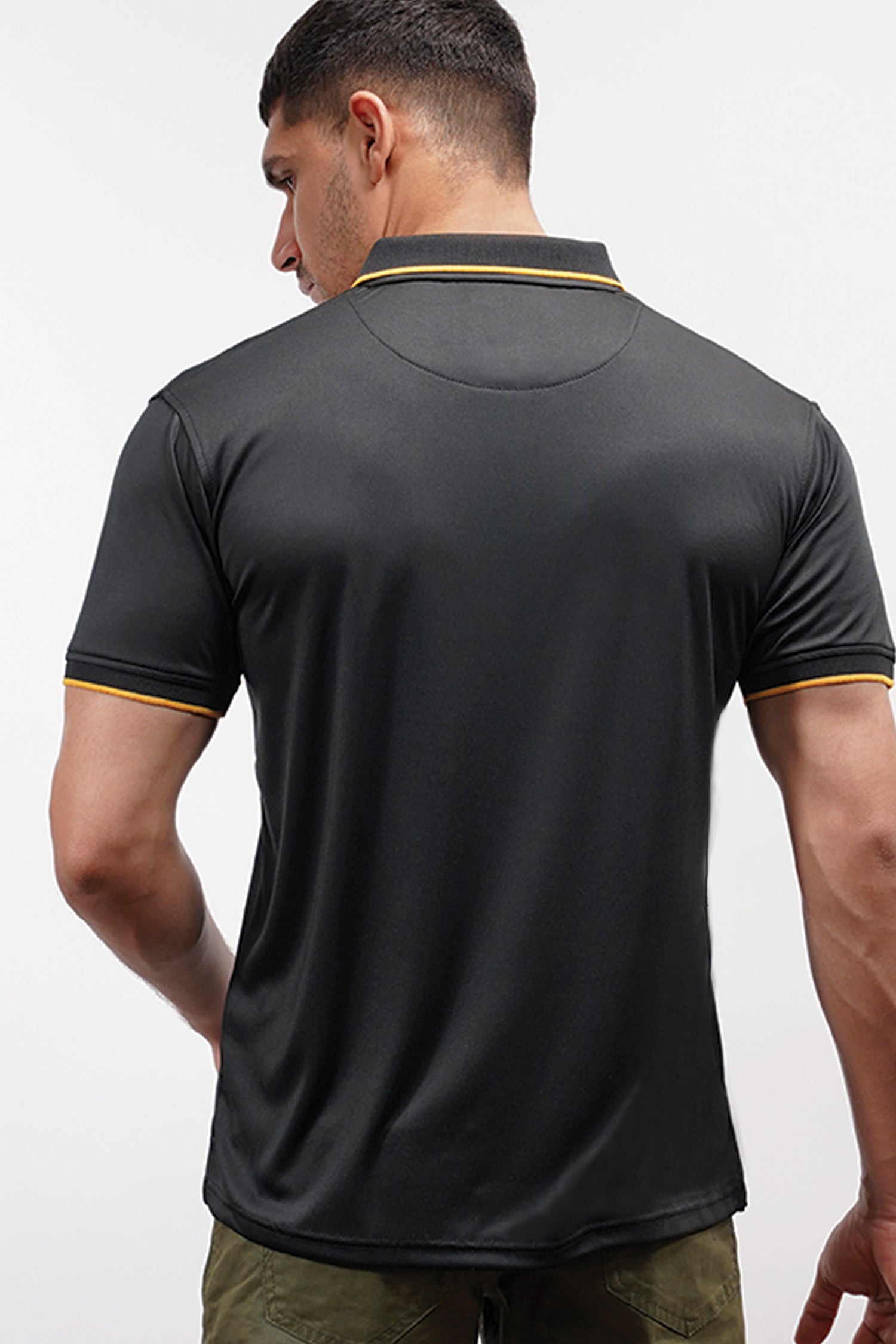 Mens athletic polo shirt in black with yellow screen print and contrast collar and sleeves by JULKE