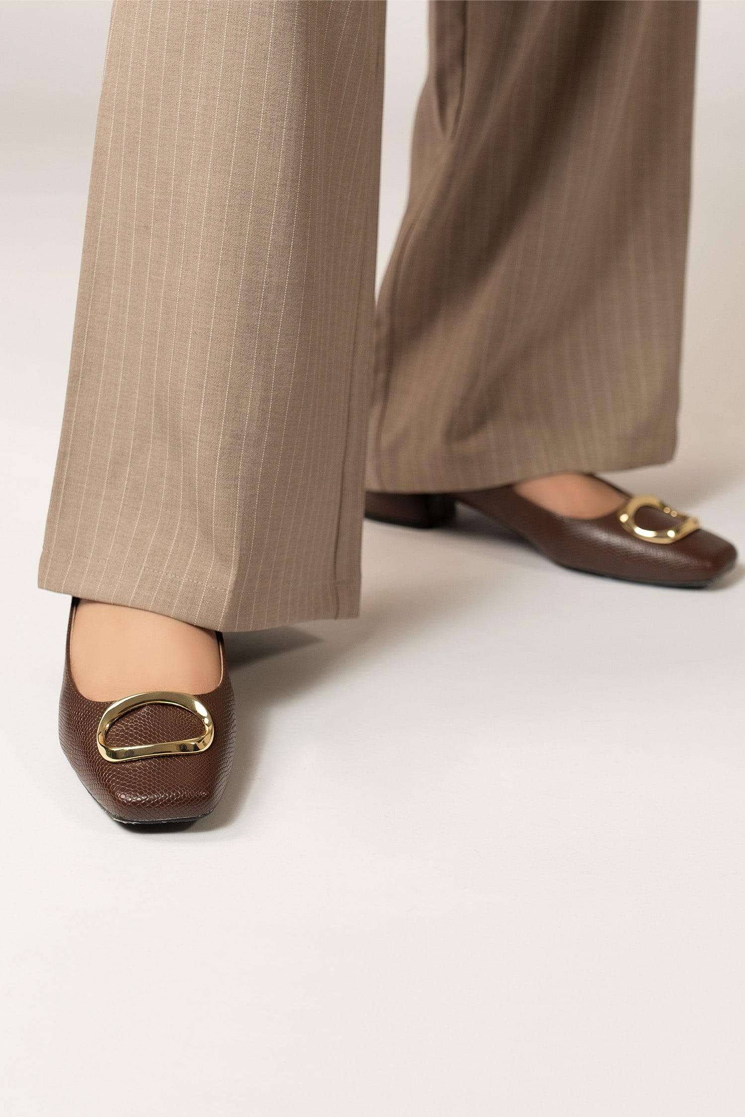 Womens square toe block heels in dark brown colour with reptile texture and metallic gold oval shaped buckle by JULKE.