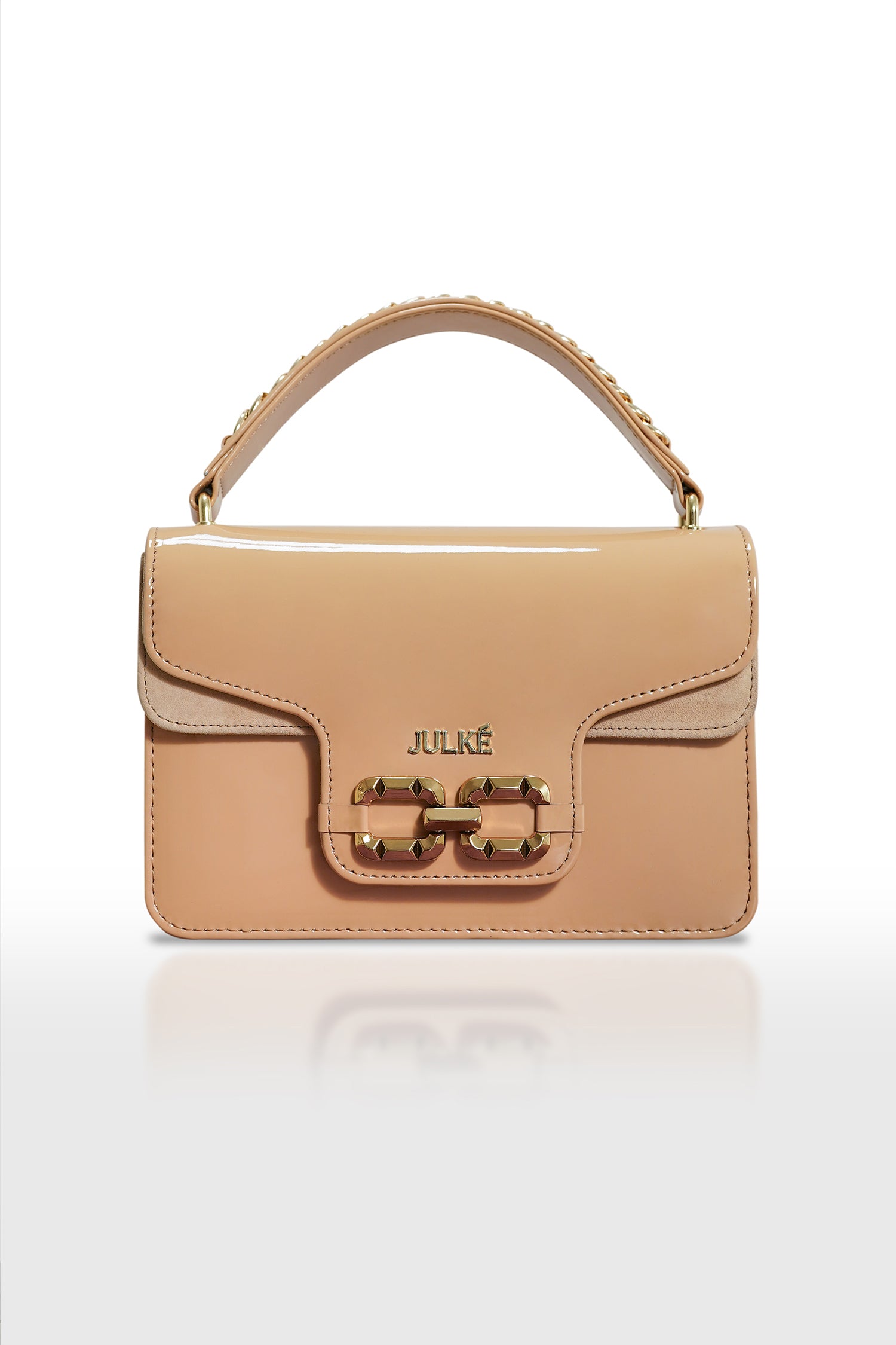 Women's leather top handle shoulder bag in beige coloured patent and suede with golden chain and buckle brooch by JULKE