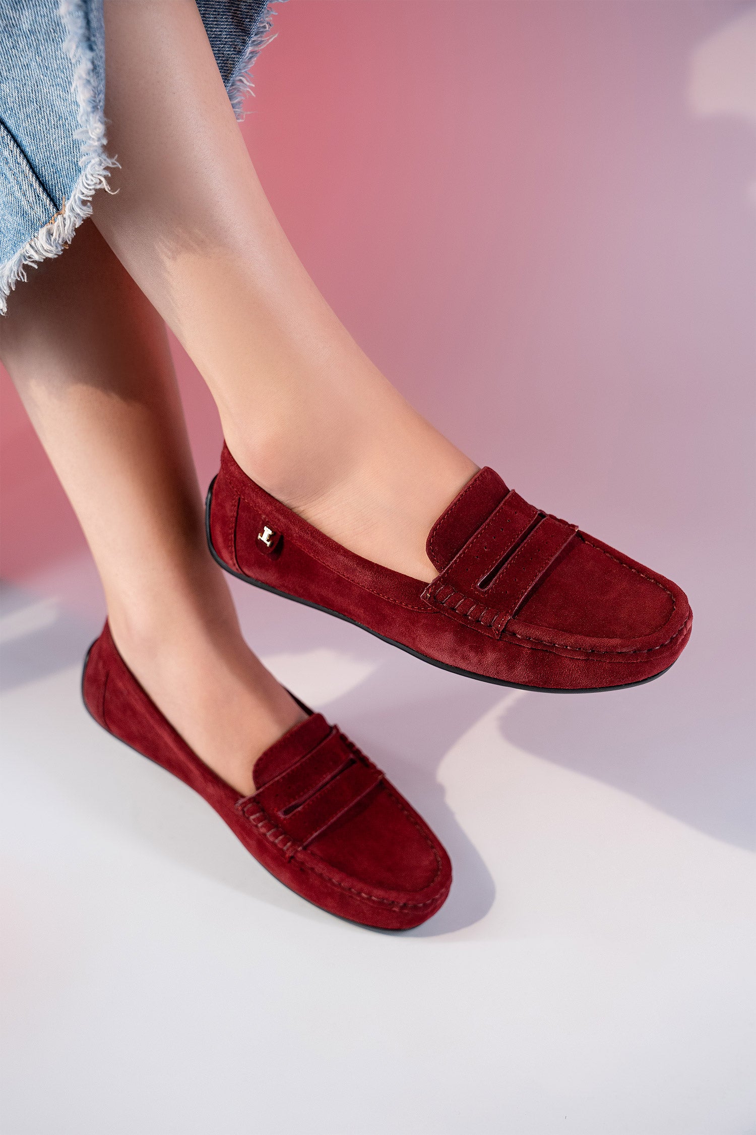 Women's winter suede leather moccasins in maroon colour with metal logo trim and moc toe by JULKE