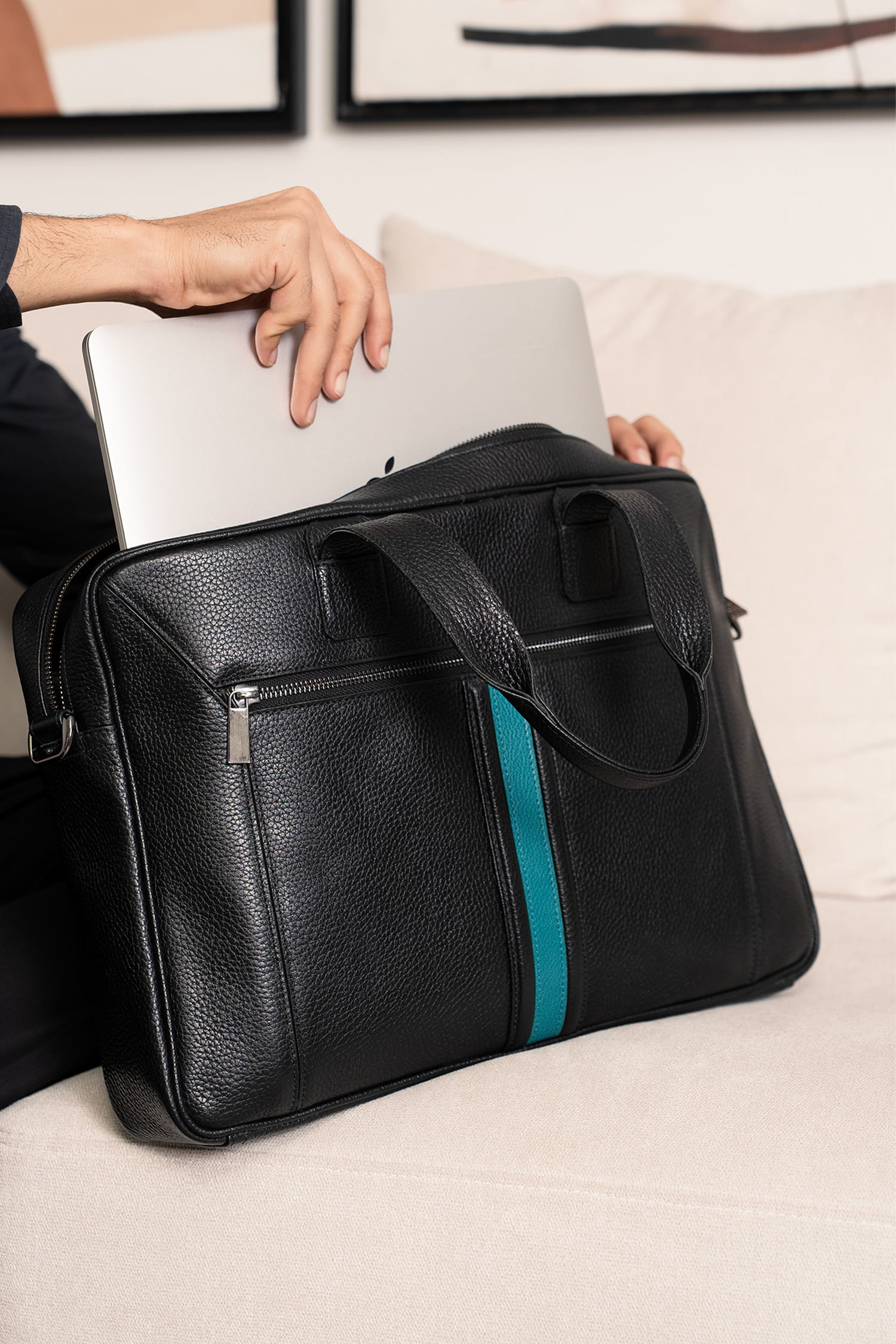 Mens soft leather laptop bag in black colour with turquoise leather stripe in front and metallic grey hardware by JULKE.