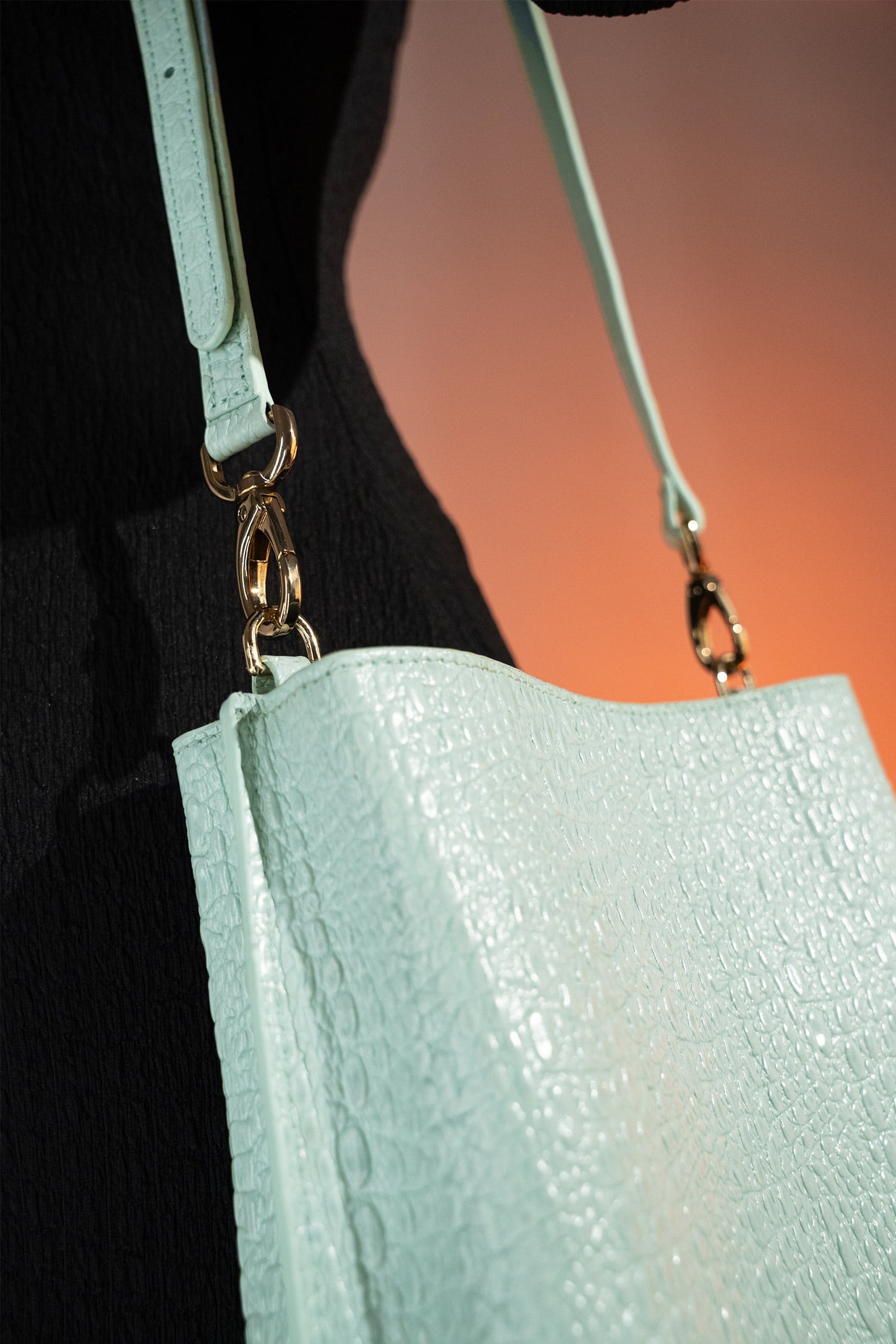 Women's leather bucket bag in mint blue colour with 3D texture and detachable shoulder strap by JULKE