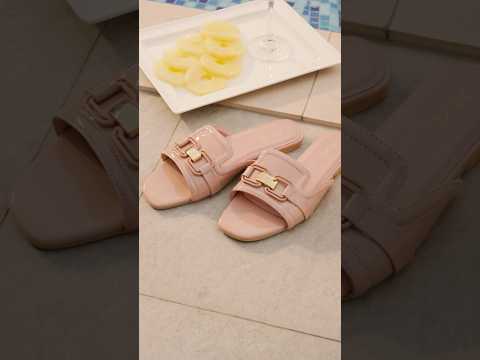 Womens patent faux leather flat slides in light pink & beige colours with matching horsebit buckles by JULKE.