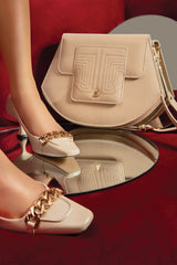 Women heels in nude colour with square toe, gold chain and matching bag by JULKE