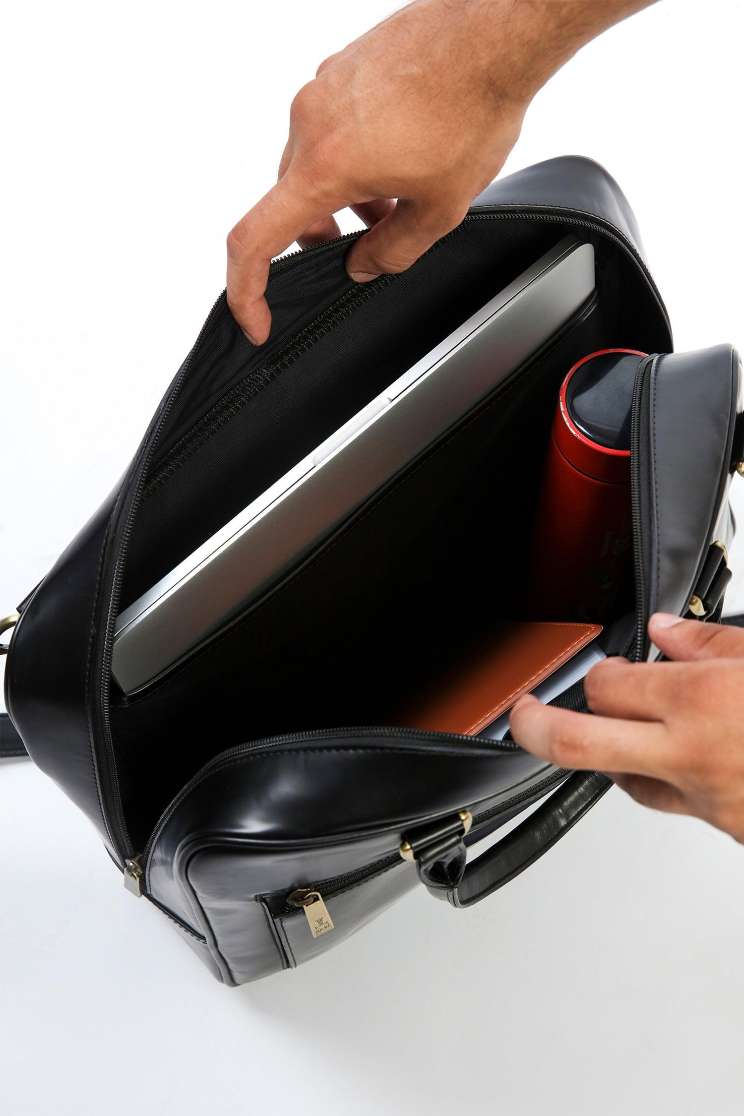 Leather laptop bag in black colour with glossy finish by JULKE