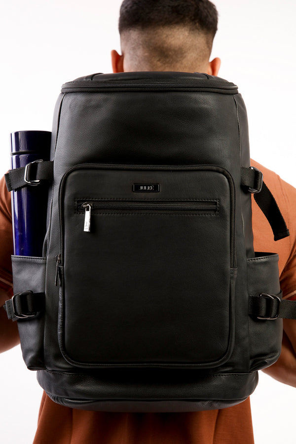 Mens original leather backpack in black colour with extra pockets for travel and hiking by JULKE
