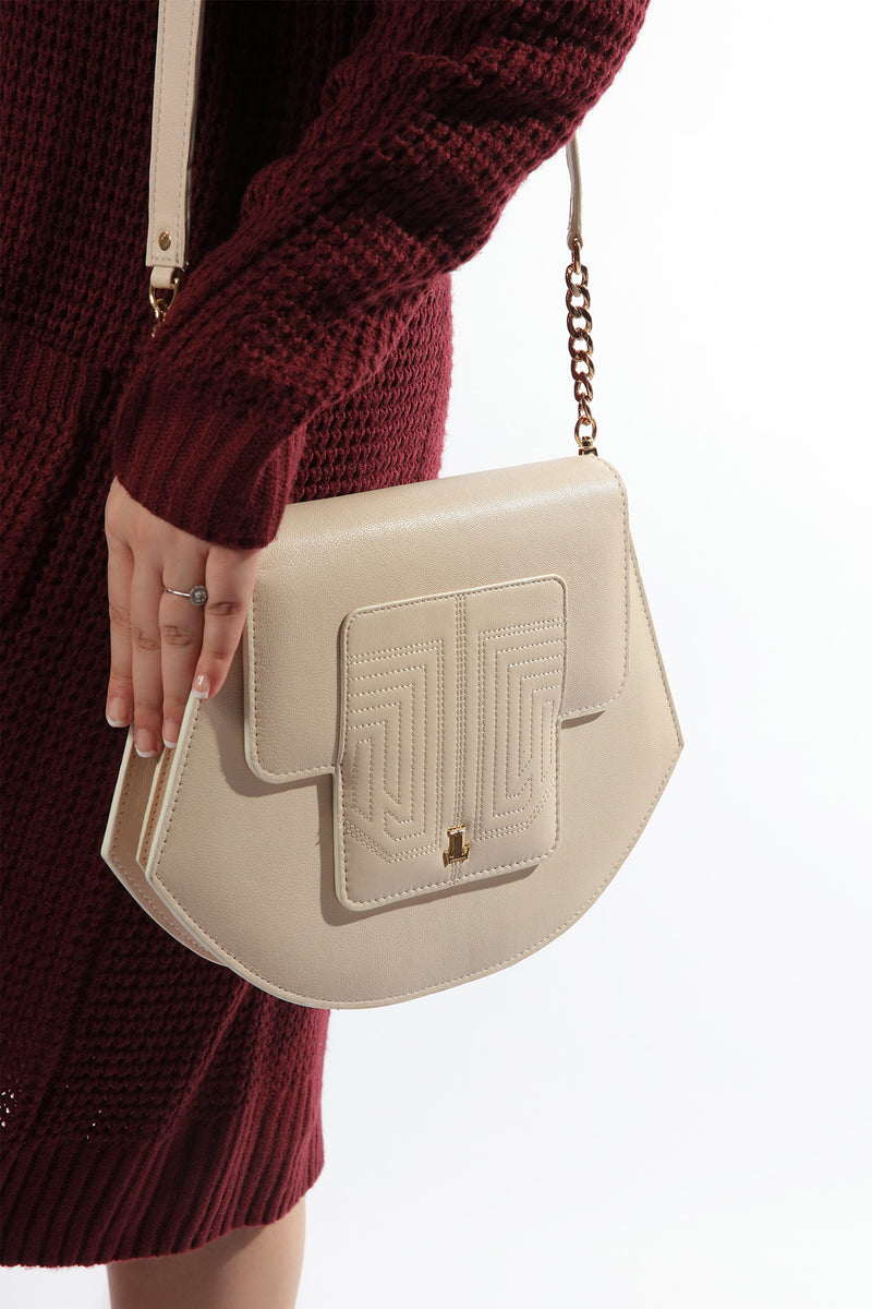 Womens leather shoulder bag in beige colour in accordion shape  with quilting by JULKE