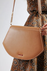 Womens leather shoulder bag in light brown colour in accordion shape with quilting by JULKE