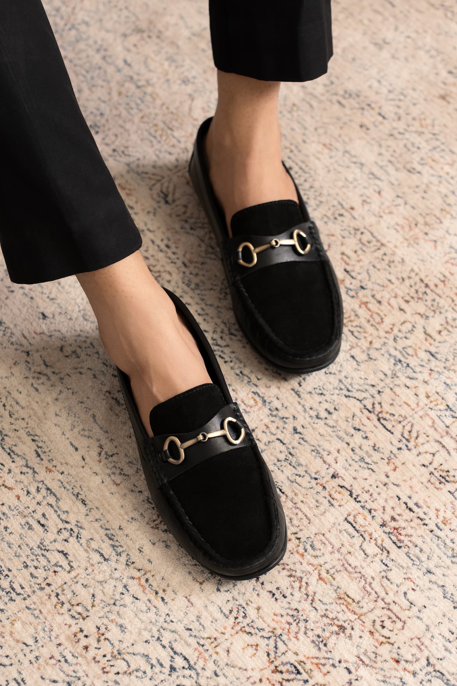 Mens suede and leather moccasins in black colour with metallic light gold horsebit buckle by JULKE. 