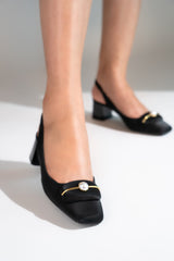 Women's black block heel slingback shoes with square toe and  matching pearl and satin brooch by JULKE. 