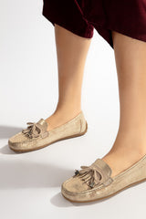 Women leather moccasins in beige colour with  glitter bow and  fringe by  JULKE