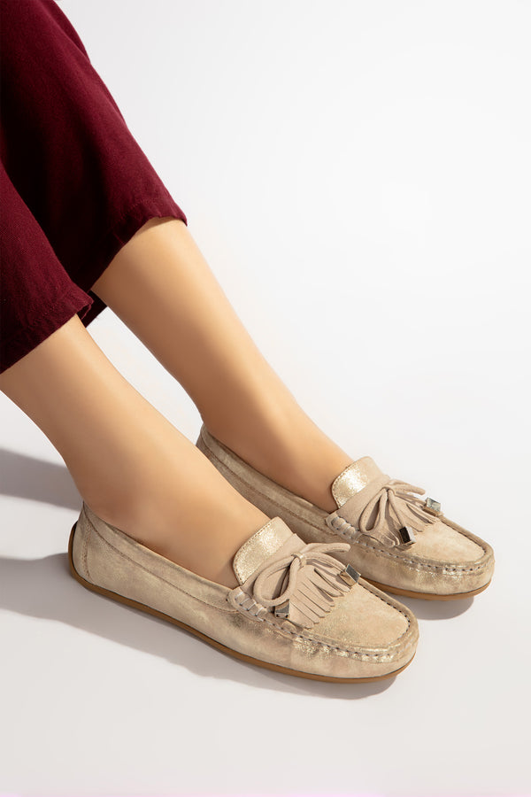 Women leather moccasins in beige colour with  glitter bow and  fringe by  JULKE
