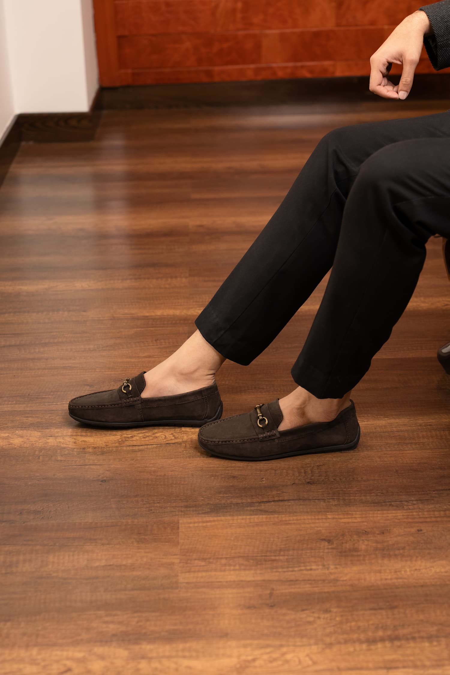 Mens suede leather moccasins in brown colour with metallic dull gold hardware by JULKE. 