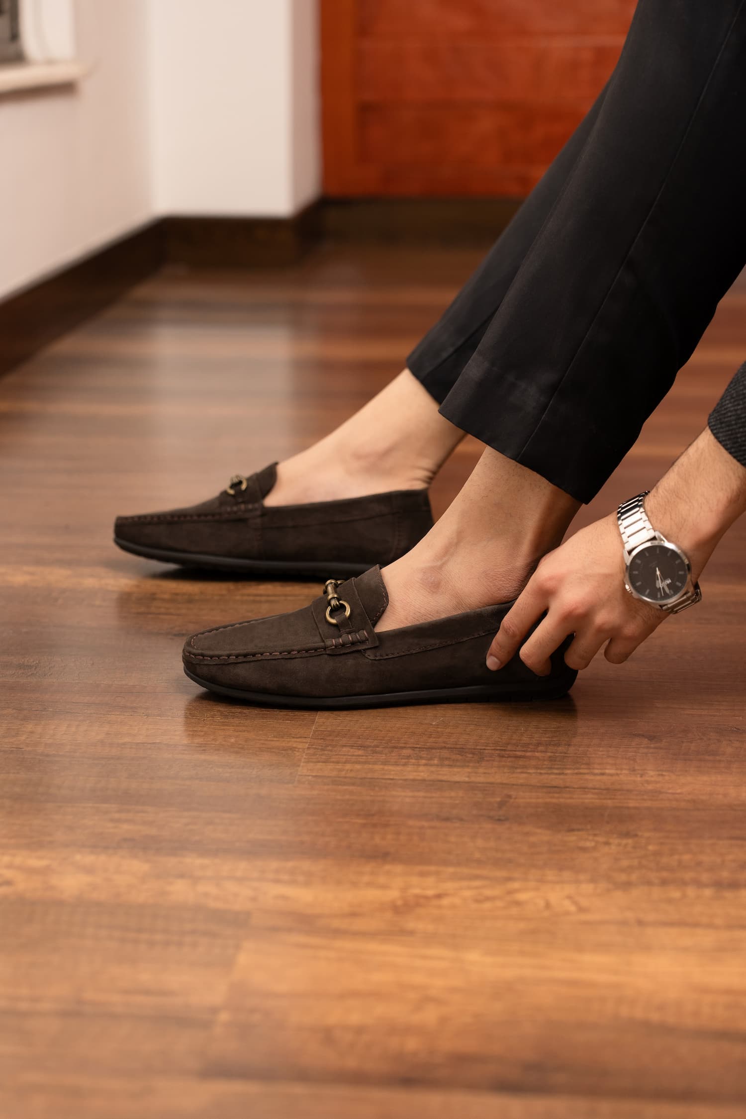 Mens suede leather moccasins in brown colour with metallic dull gold hardware by JULKE. 