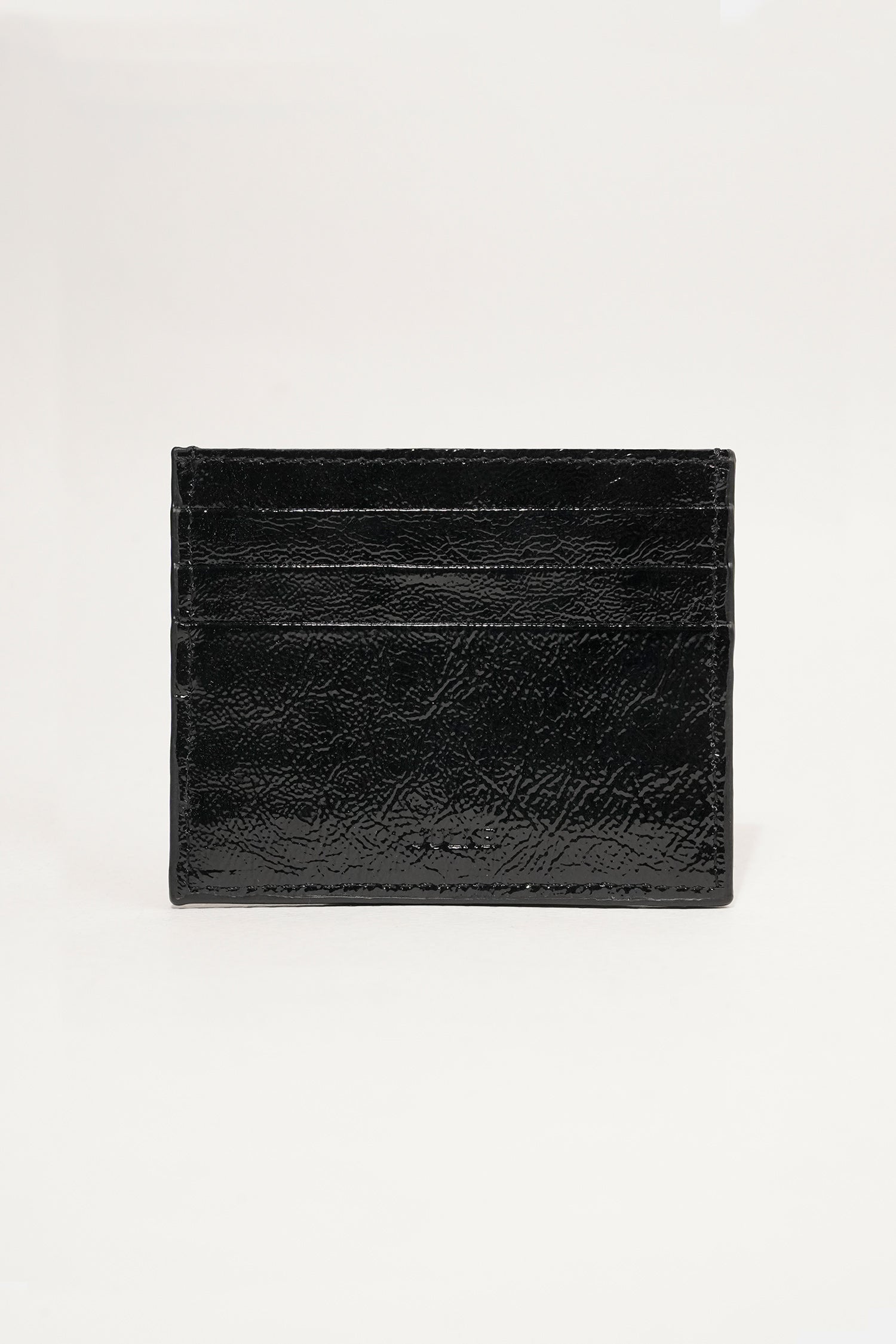 Unisex leather card holder in Black colour with woven patch and hidden pocket by JULKE