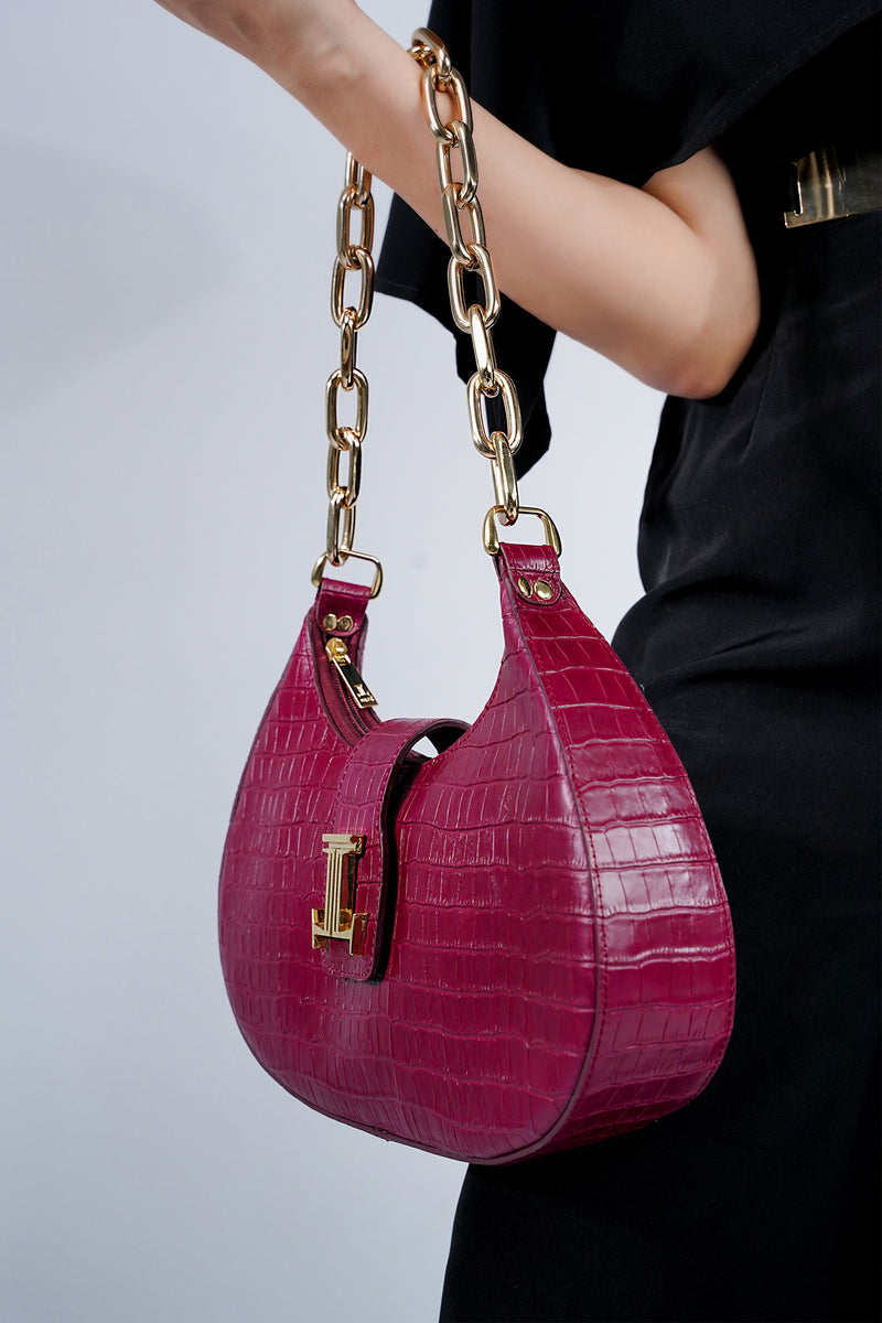 Womens leather shoulder baguette bag with croco texture and  gold chain in maroon colour by JULKE