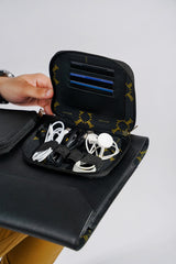 Leather laptop sleeve in black colour with front pockets by JULKE