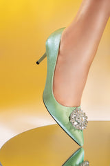 Women heels in light green colour with pointed toe and diamond flower buckle by JULKE