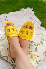 Womens summer leather flats in yellow colour with padded chain pattern by JULKE