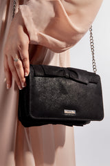 Womens leather shoulder bag in black colour with bows and pearl chain by JULKE