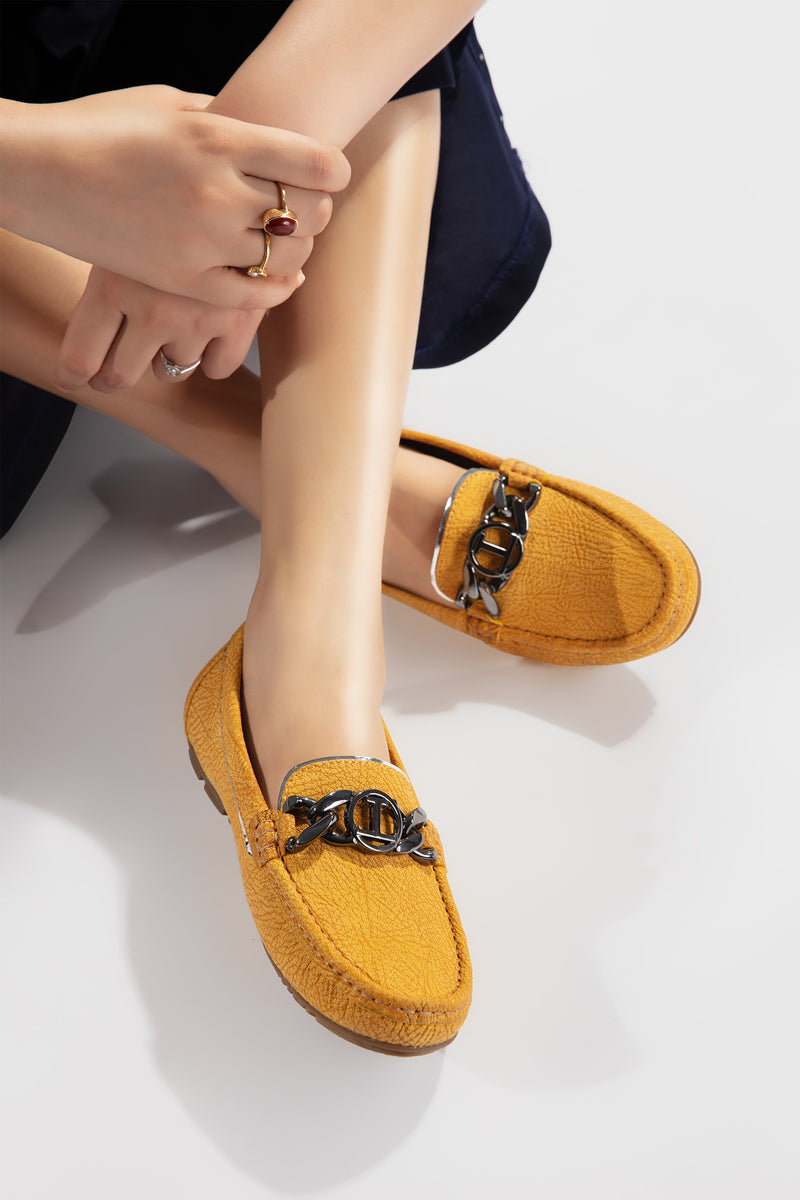 Women leather moccasins in yellow colour with texture, metal chain and logo by  JULKE