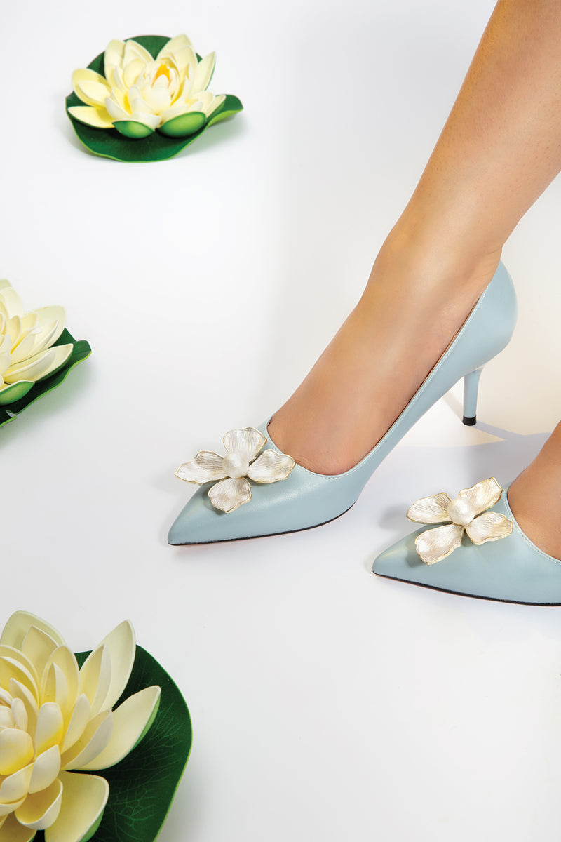 Women heels in light blue colour with pointed toe with flower and  pearl buckle by JULKE