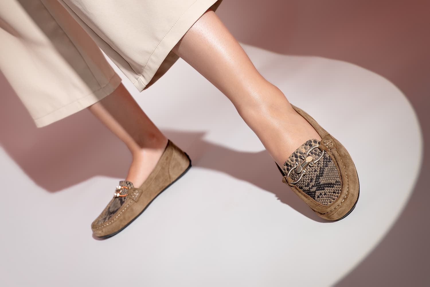 Womens leather moccasins in light brown colour with replile texture vamp and metallic gold D-buckle by JULKE.