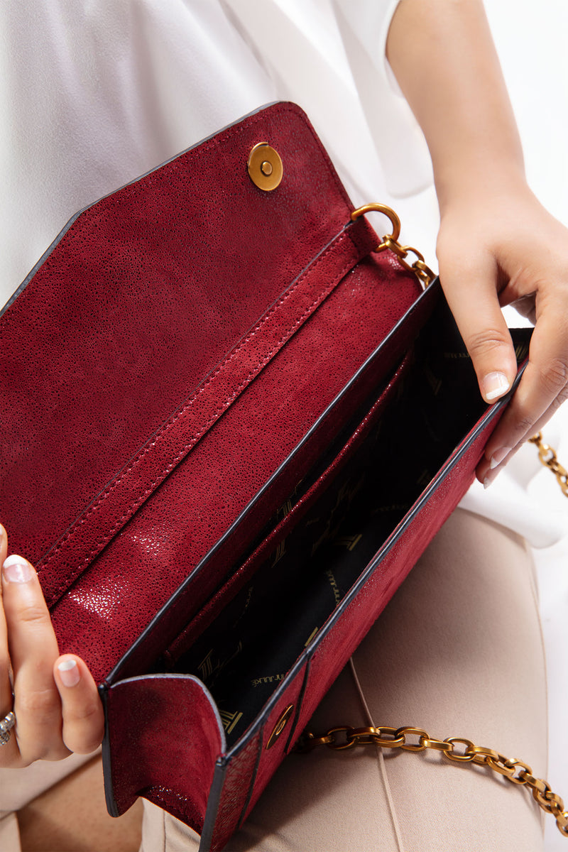 Womens leather shoulder bag in dark red colour with gold chain by JULKE