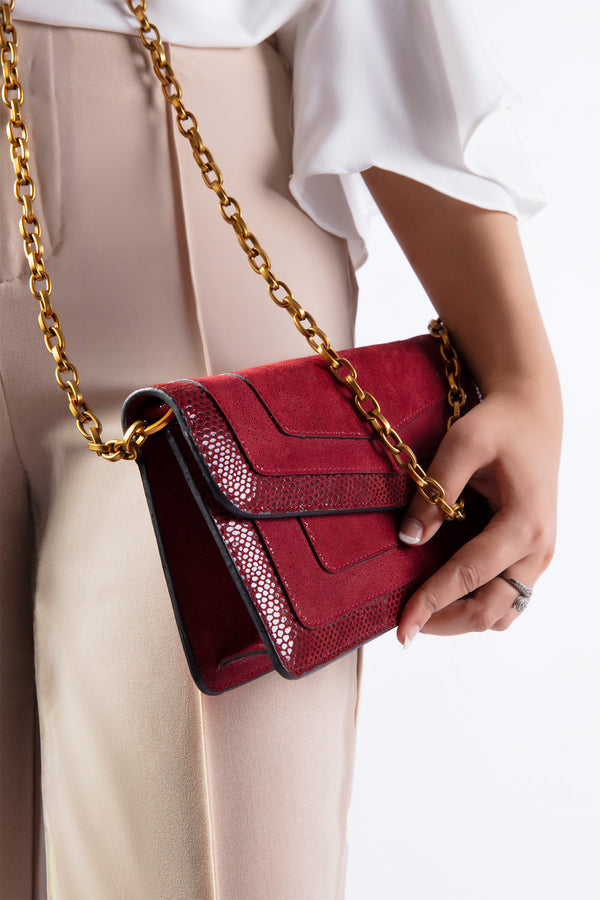 Womens leather shoulder bag in dark red colour with gold chain by JULKE