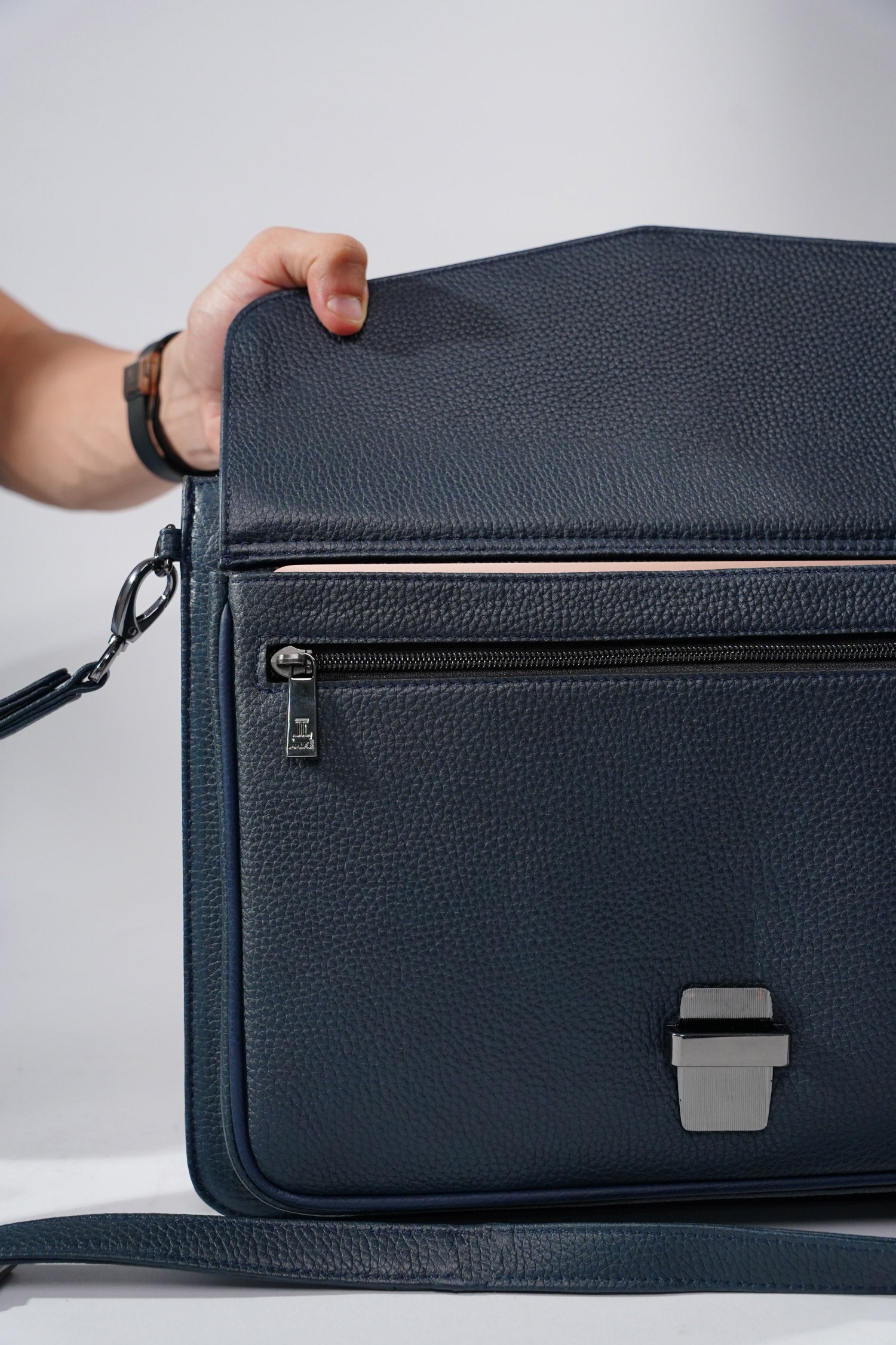 Leather laptop sleeve in navy blue colour with shoulder strap by JULKE