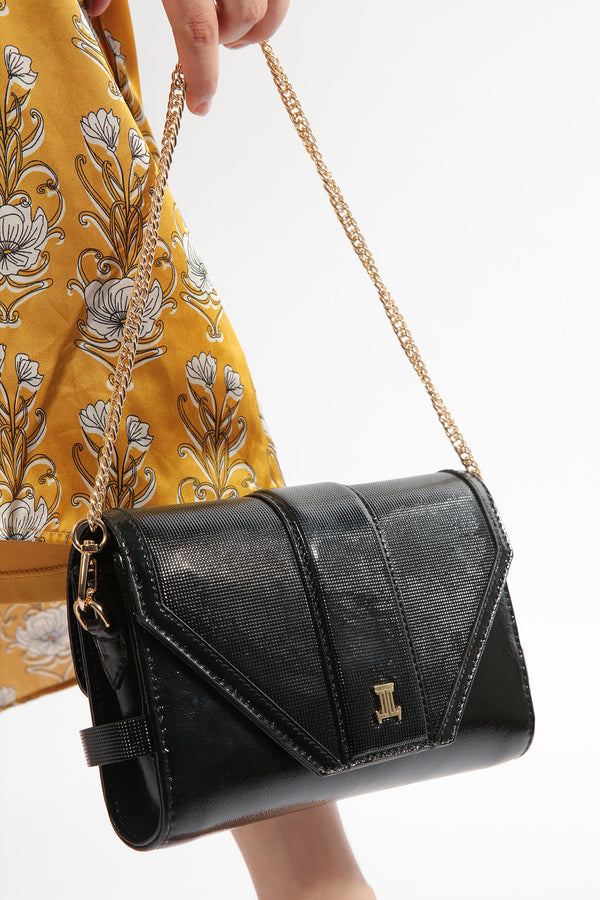 Womens leather shoulder bag clutch in black colour with gold chain and buckles by JULKE