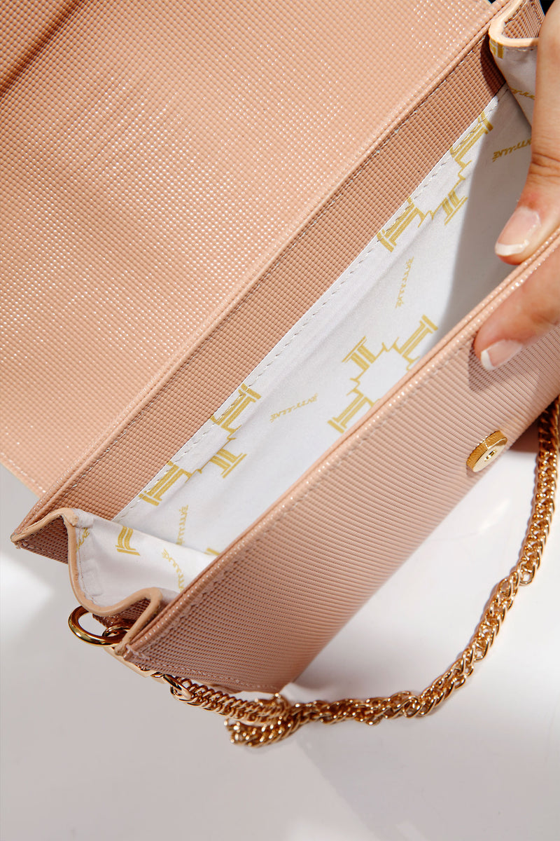 Womens leather shoulder bag clutch in light pink colour with gold chain and buckles by JULKE