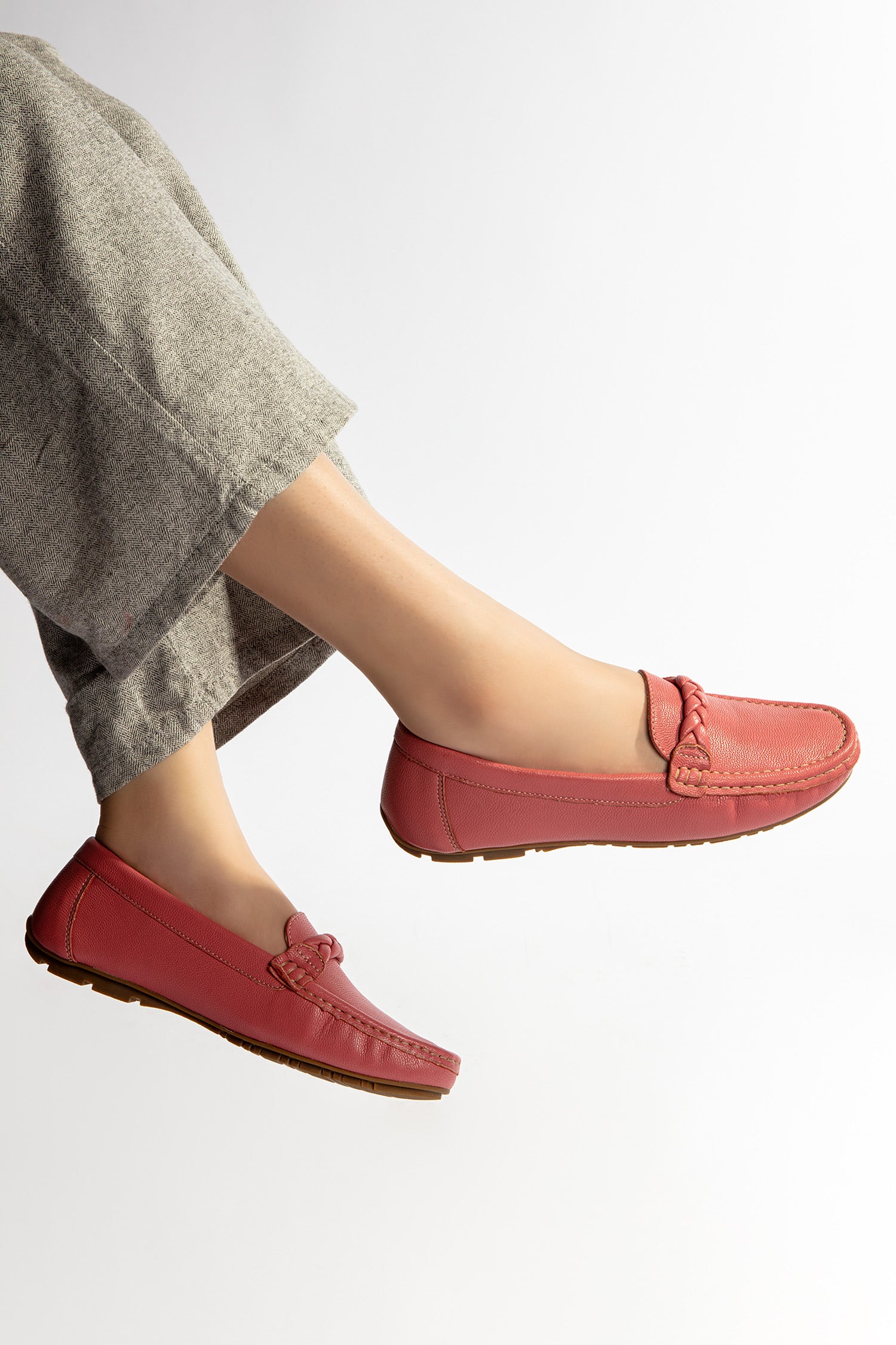 Womens winter moccasins in pink colour with braided straps by JULKE