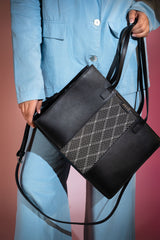 Women's leather tote bag medium size in black colour with diamond pattern fabric strip and detachable shoulder strap by JULKE. 