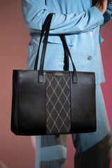 Women's leather tote bag medium size in black colour with diamond pattern fabric strip and detachable shoulder strap by JULKE. 